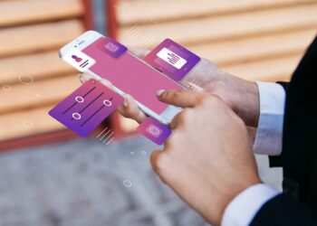 Person using a smartphone with floating digital app icons and graphs overlaid, suggesting app or data management.