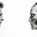 A man and a humanoid robot face each other closely against a plain white background, highlighting the contrast between human features and robotic mechanics. | LESSINVEST